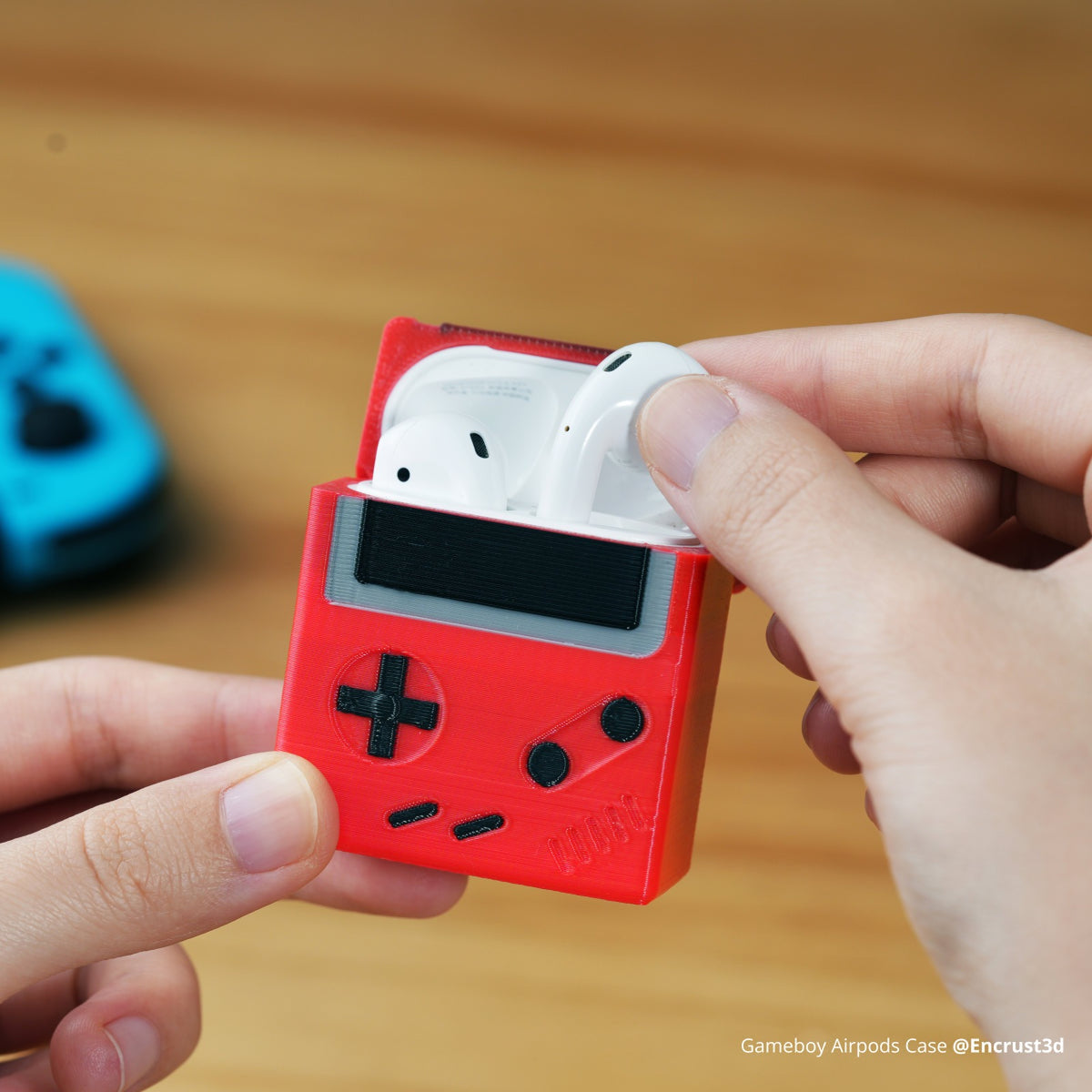 Red retro game style earbud case printed in Bambu TPU for AMS