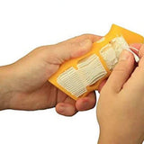 Close-up of white PolySupport peeling cleanly from orange PLA print