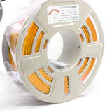 RepRapper Tech Silk PLA spool vacuum-sealed in clear bag with desiccant, speckled spool and RepRapper label visible