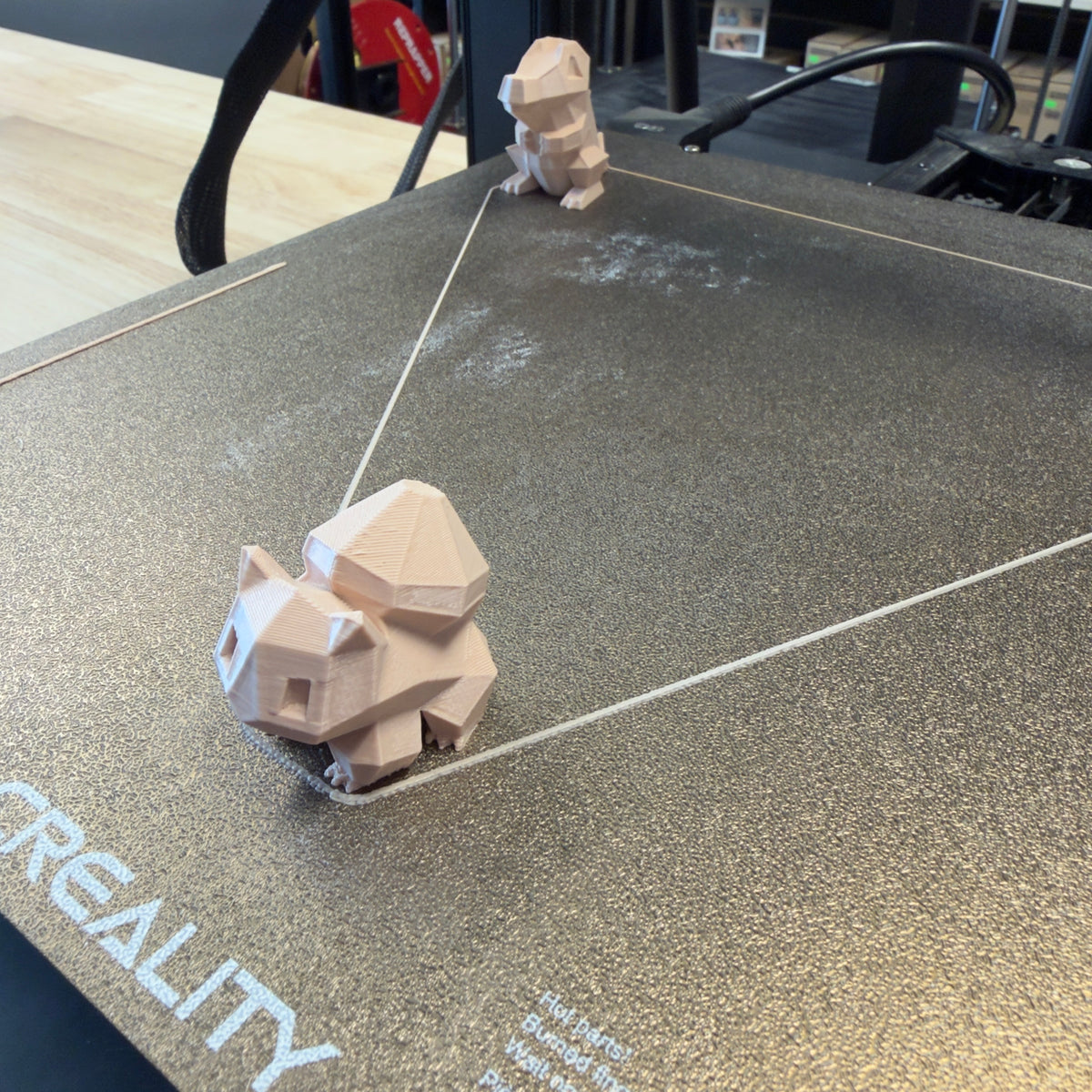 Refurbished Creality CR-10 Smart Pro 3D Printer — test prints on bed