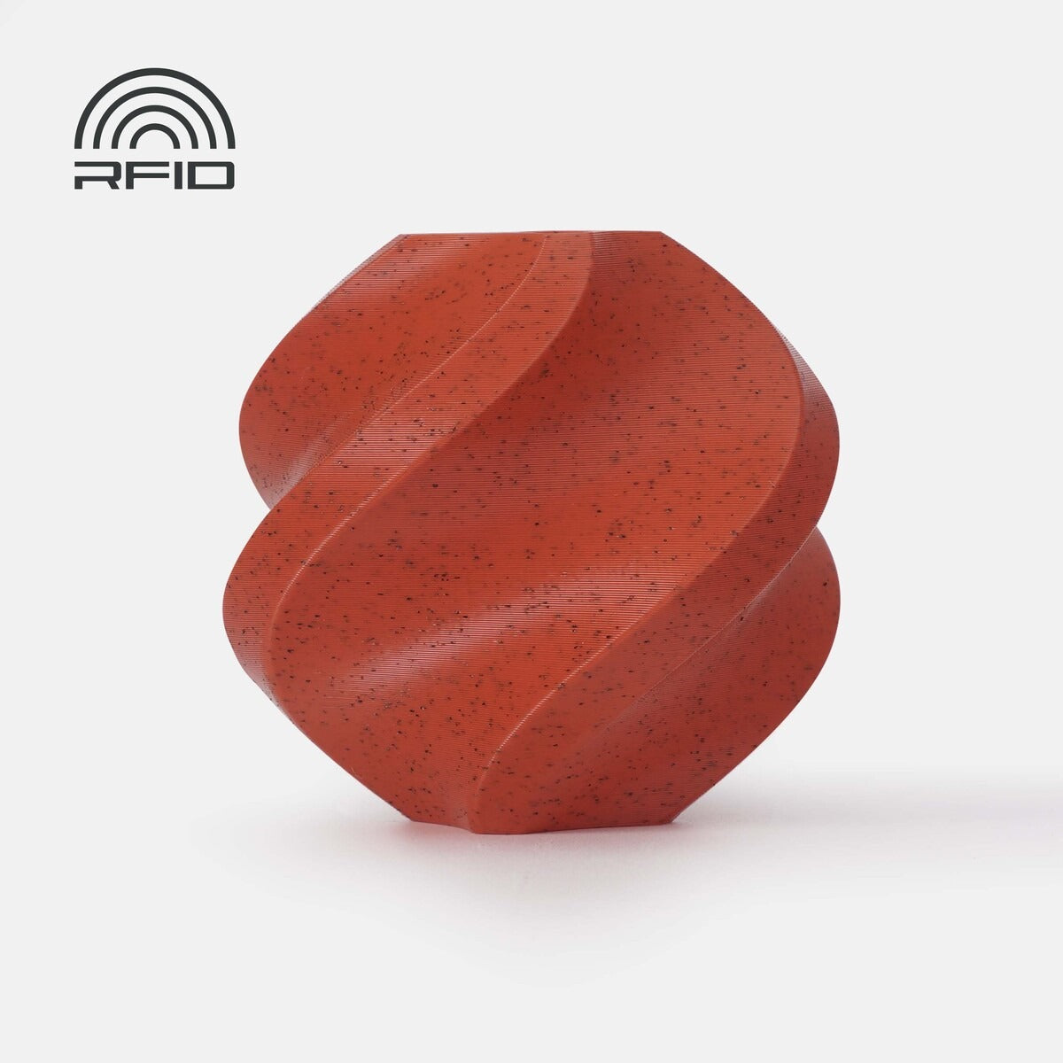 Red Granite twisted vase print sample with RFID badge on white studio background