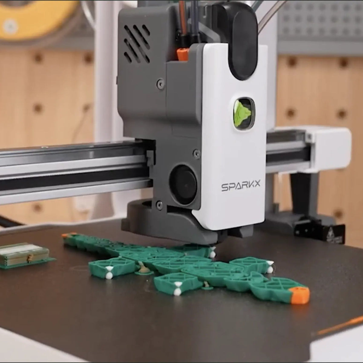 Batch of multicolor parts on the SPARKX i8 build plate