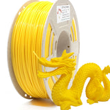Bright yellow RepRapper Tech PLA spool with visible neat windings next to a matching yellow 3D-printed oriental dragon figurine on white background