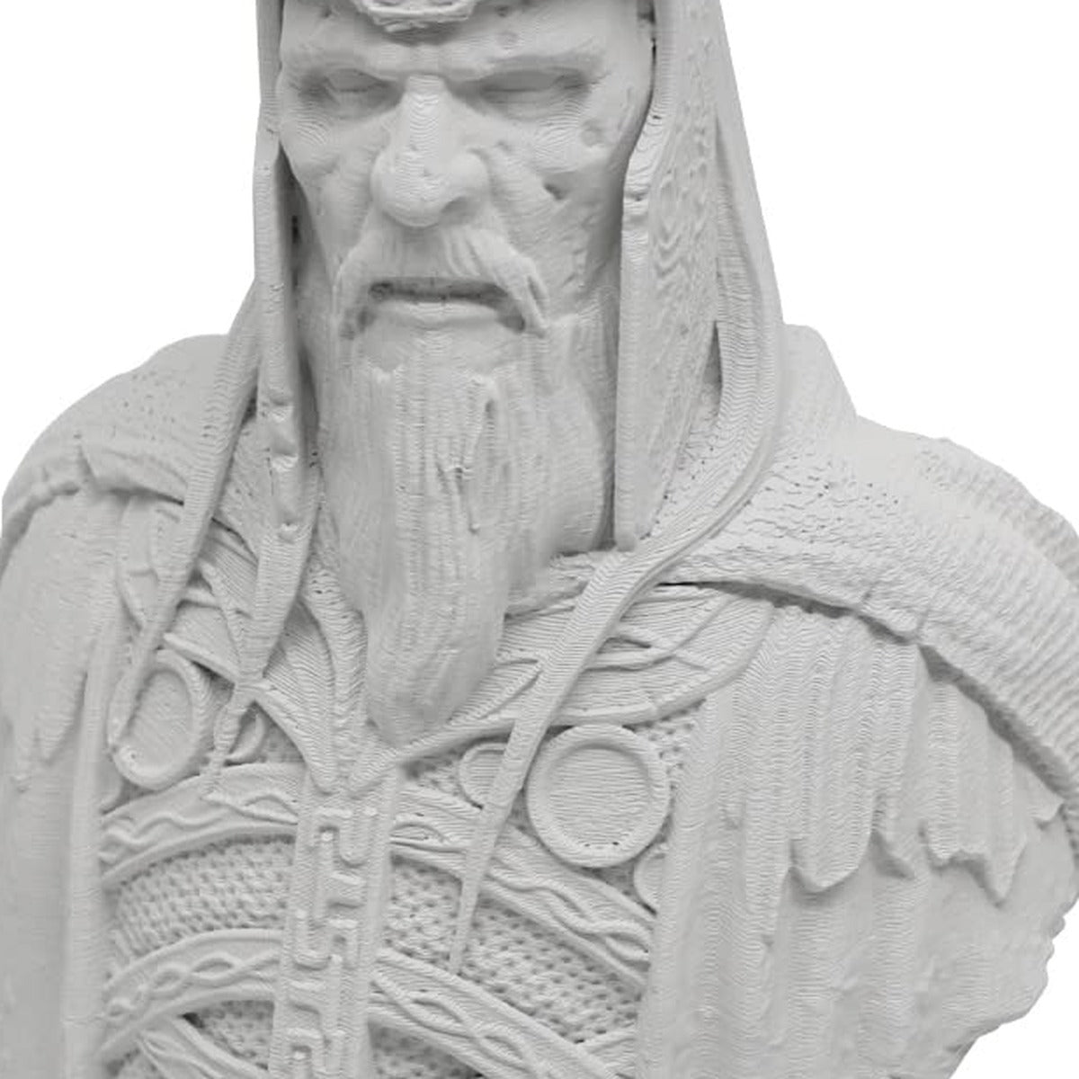 Close-up of a high-detail 3D-printed fantasy king bust in light grey/off-white PLA showing matte finish, woven armor textures, and clear FDM layer lines