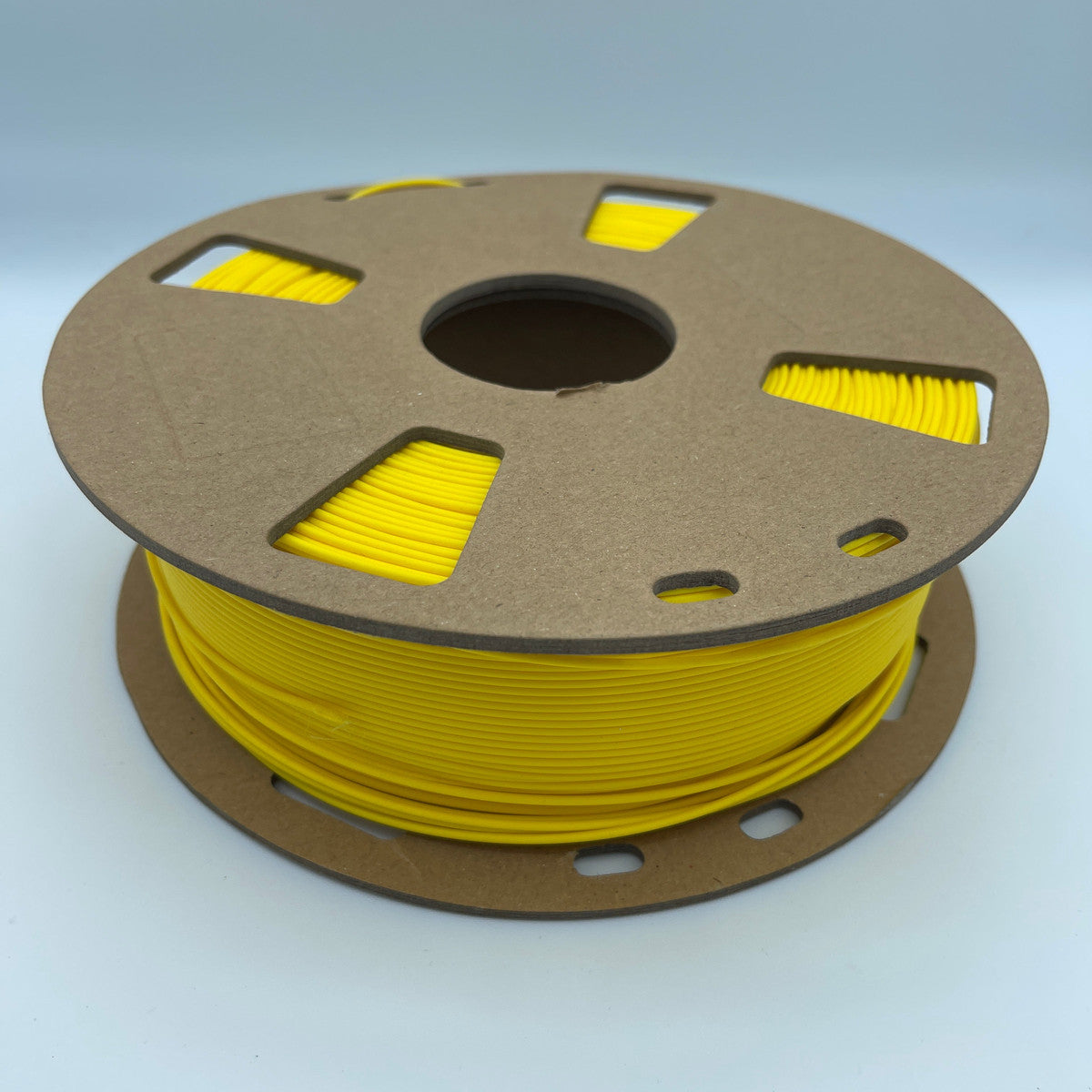 Matter3D Performance PLA Yellow filament on cardboard spool