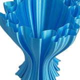 3D-printed ruffled organic vase in cyan/sky-blue RepRapper Tech PLA with satin sheen and visible layer lines on white background