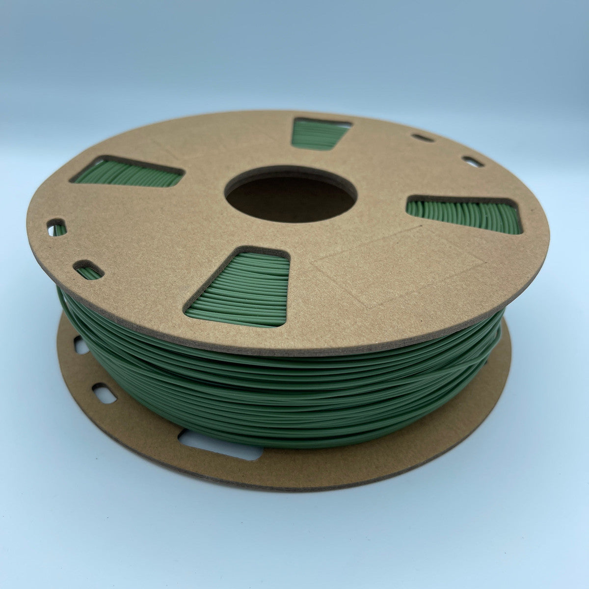 Matter3D Performance PLA Green filament on cardboard spool