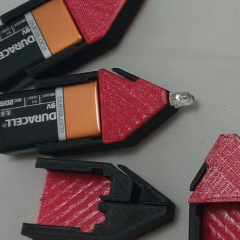 RepRapper Tech Conductive printed 9V battery holder lighting an LED (manufacturer)
