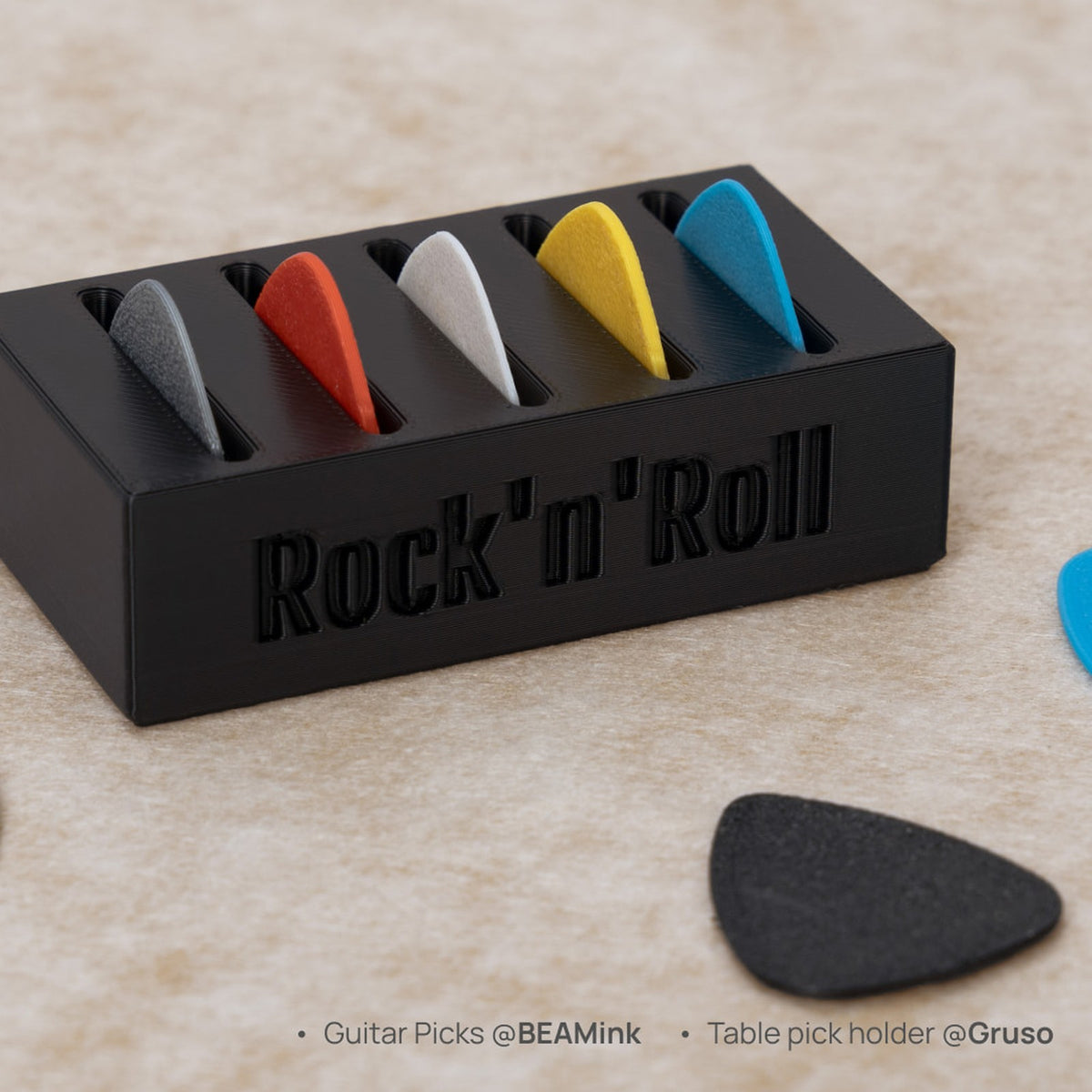Guitar picks and a pick holder 3D printed in Bambu PLA Tough+ colours