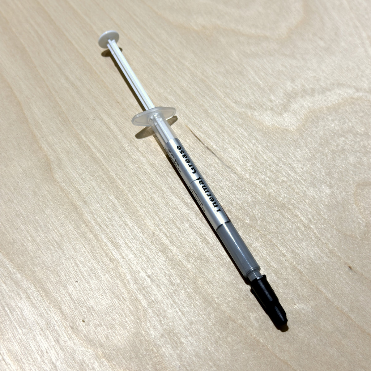 Halnziye HY880 thermal paste syringe, Thermal Grease label side, for mainboards and chips